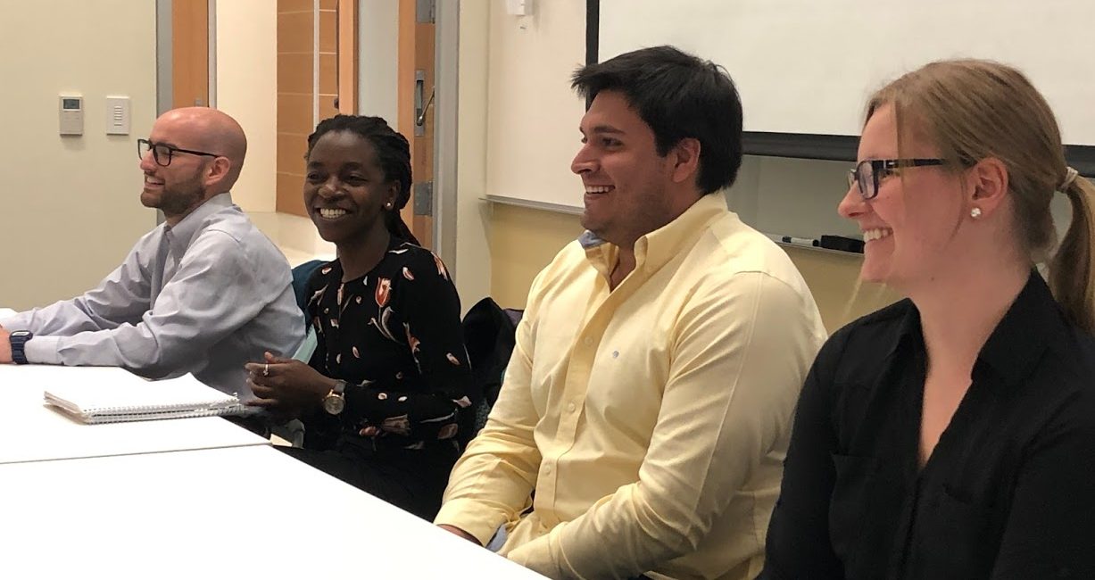 EAP students sitting at a desk.