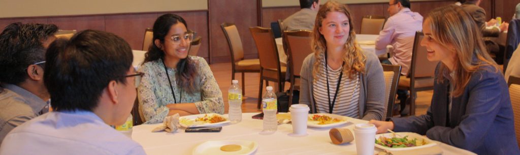 Students eating at conference.