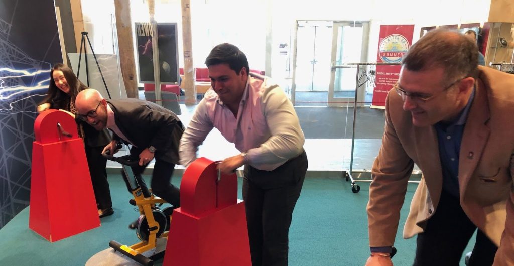 Students use exercise equipment on the Milwaukee 2023 EAP networking trip.