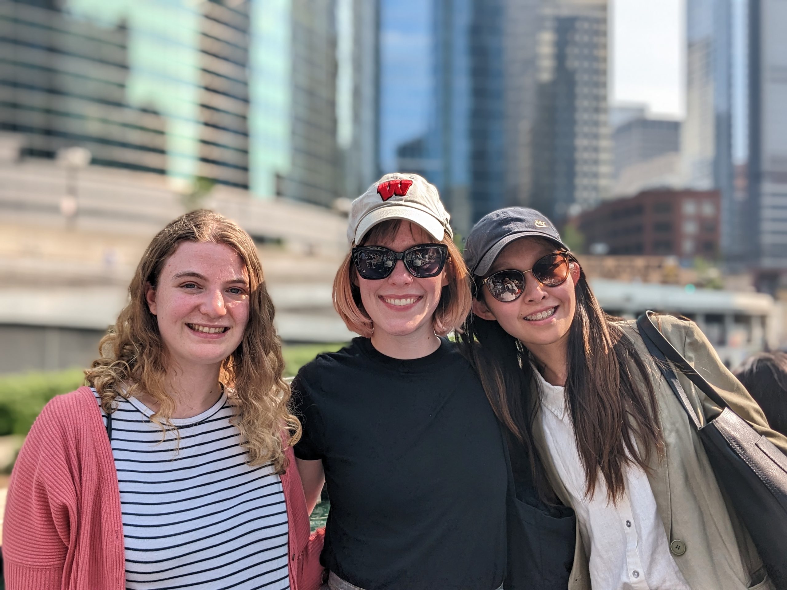 Three graduate students posing for photo during Chicago networking Trip