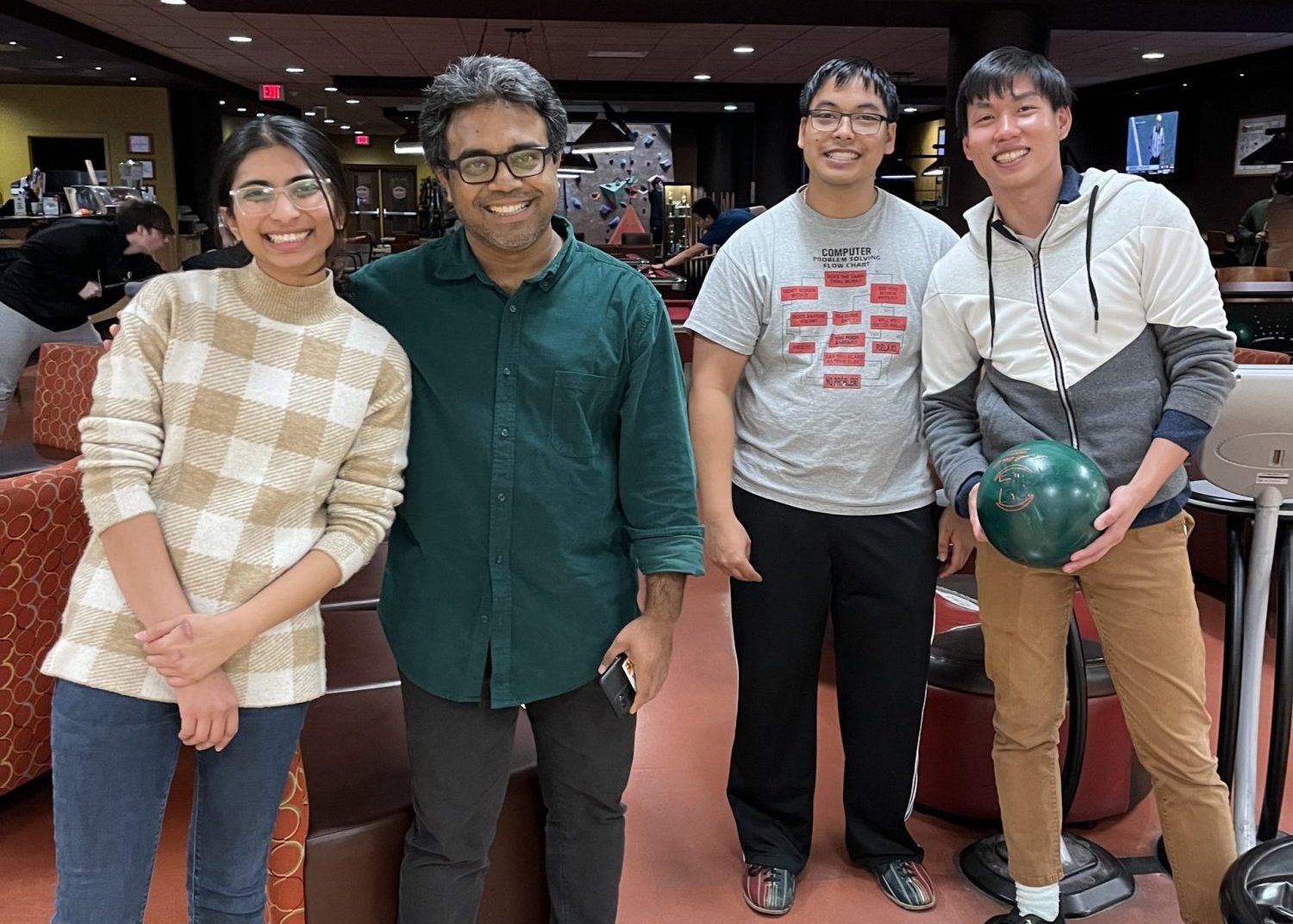 Picture of four EAP students at a Bowling Night social event